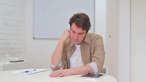 Vertical Video, Sleeping Young Man Relaxing at Workplace Stock Footage 312914490