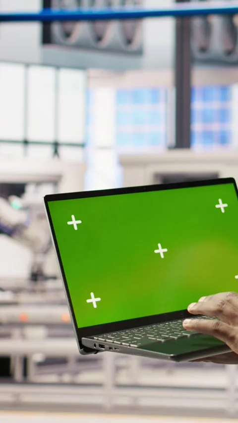 Vertical video Smart factory mechanic testing automated systems using isolated Stock Footage 307145249