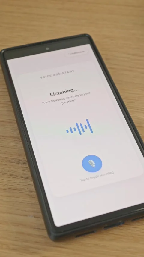 Vertical video of smartphone with voice assistant interface processing audio Stock Footage 341860591