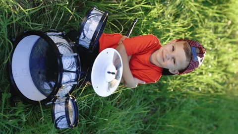 Vertical video of smiling drummer boy crossed arms smiling at camera posing Stock Footage 248208410