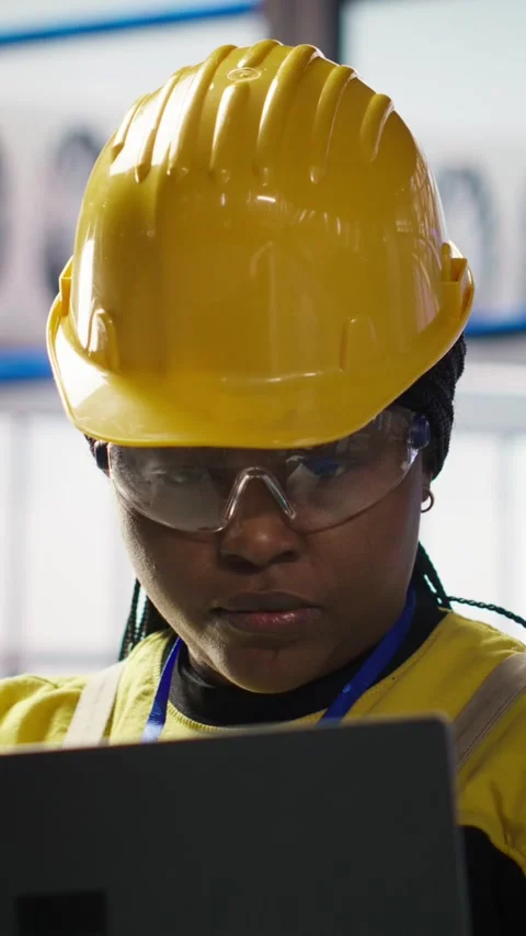 Vertical video Smiling smart factory specialist testing automated systems to Stock Footage 307068503
