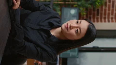 Vertical video Smiling software developer typing machine learning app code on Stock Footage 194145605