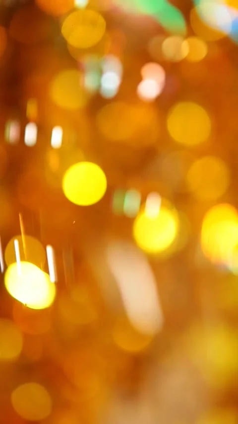Vertical video of soap bubbles gold bokeh Stock Footage 246480516