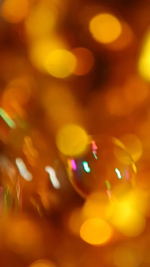 Vertical video of soap bubbles gold bokeh Stock Footage 246481447