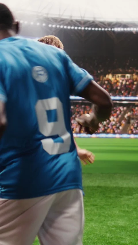 Vertical Video Soccer player with ball control in attack action running forward Stock Footage 338047124
