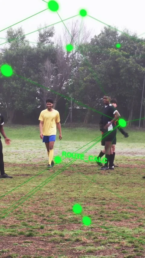 Vertical video: Soccer team and ref closing on ball after slide with ROUTE_CALC Stock Footage 333895809