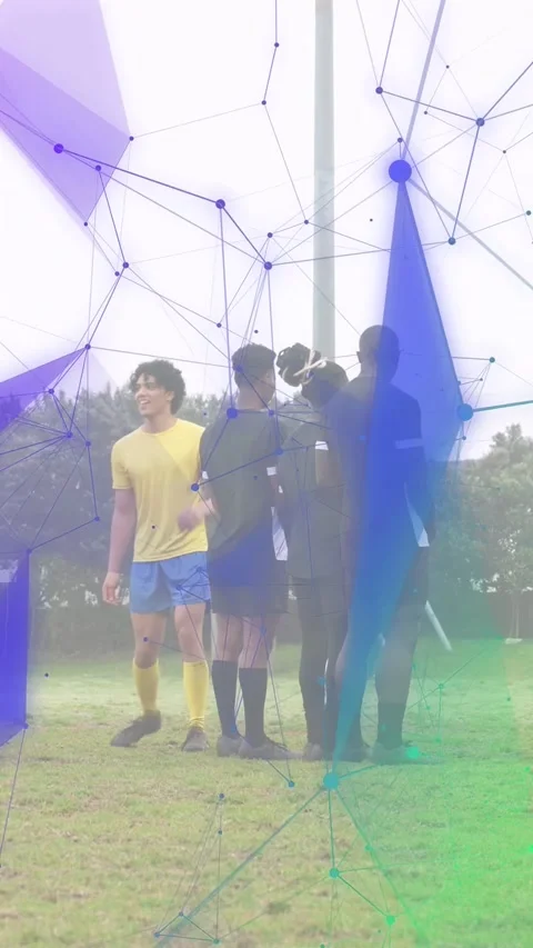 Vertical video: Soccer wall forming, yellow player walking causing node overlay Stockbeeldmateriaal 333821518