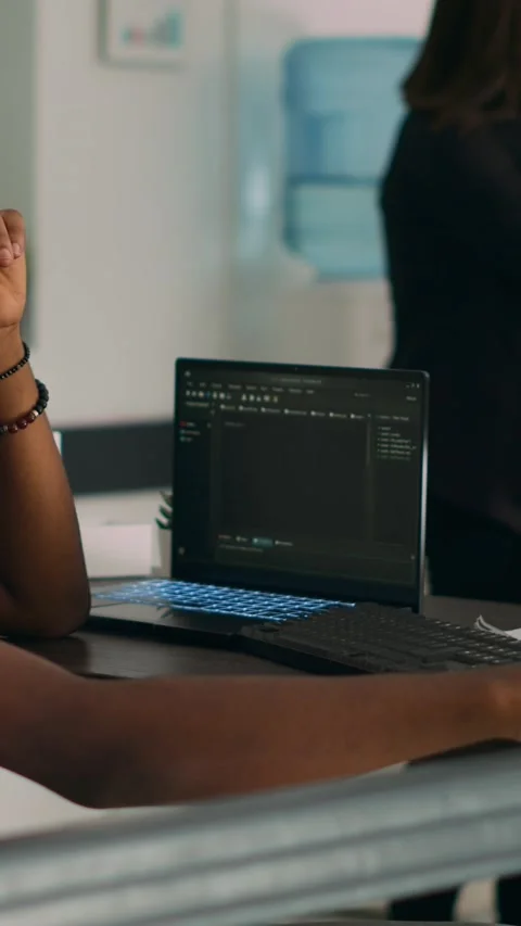 Vertical video: Software developer brainstorming ideas to write code and create Stock Footage 218577217