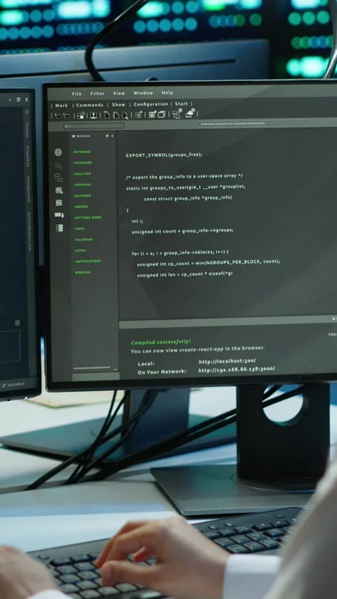 Vertical video Software developer in data center ensuring system can handle Stock Footage 280608549