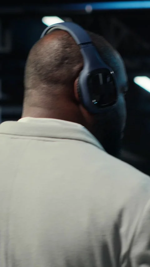 Vertical video Software developer in data center workspace coding on tablet Stock Footage 311550222