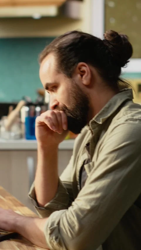 Vertical Video Software developer at home, writing code and debugging Stock Footage 330440054