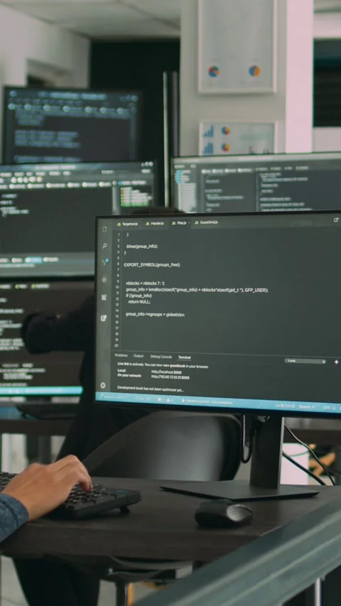 Vertical video: Software developer programming source code algorithm on computer Stock Footage 218575084