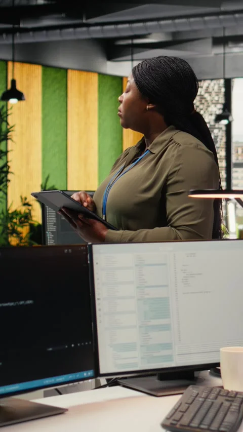 Vertical video Software developers working in AI startup training predictive Stock Footage 323236603