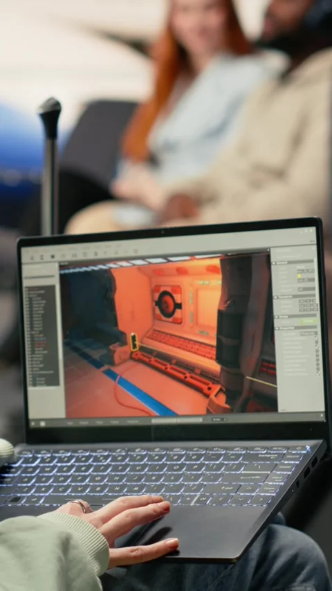 Vertical Video Software engineer creating gaming assets for video game in the Stock Footage 333612622