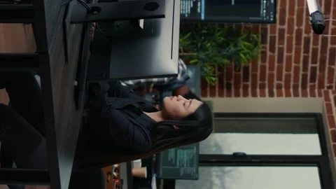 Vertical video Software engineer typing source code on computer keyboard while Stock Footage 194146416