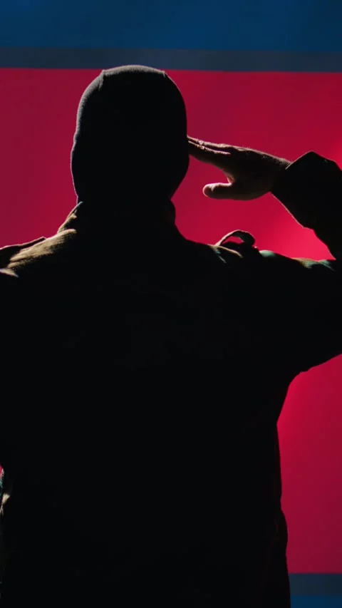 Vertical video Soldier doing saluting hand gesture towards North Korea flag Stock Footage 278191739