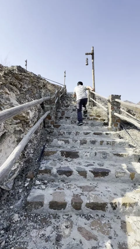 Vertical Video: Solo Content Creator Running On The Stairs Stock Footage 342581794