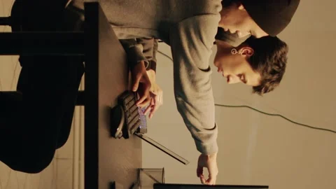 Vertical video: Spies team committing cryptojacking and cyberwarfare Video stock 228522164