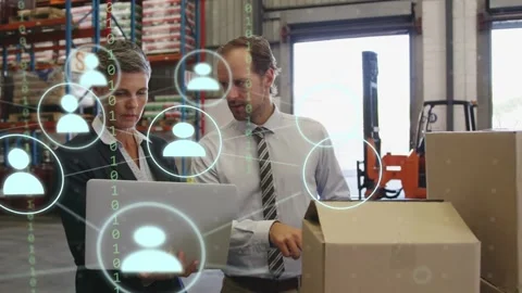 Vertical video: Staff scanning box with laptop, scanner updating stock as icons Stock Footage 333155382