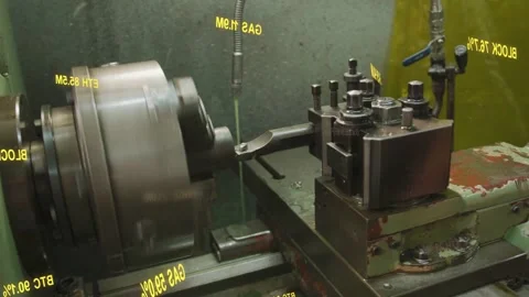 Vertical video: Starting cycle in lathe cell 3-jaw chuck rotating while tool Stock Footage 333033591