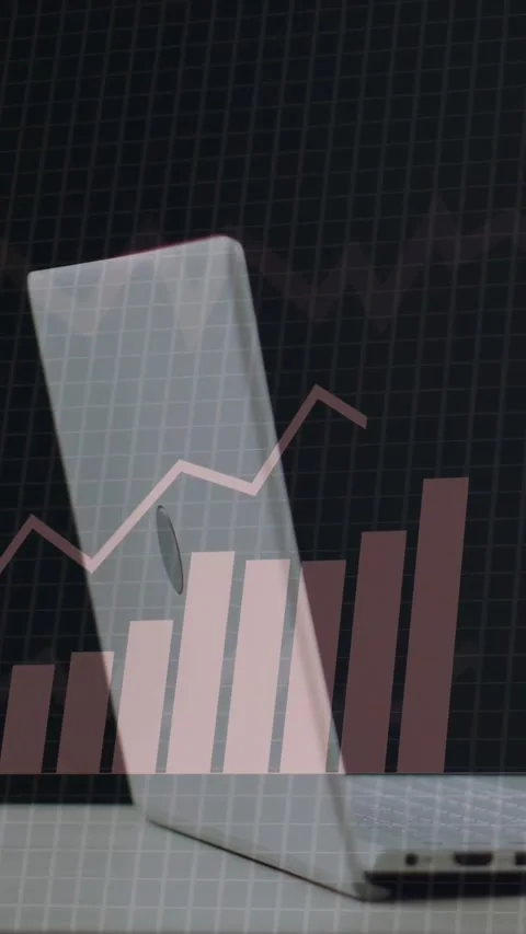 Vertical video: On startup laptop showing pie charts, data panels popping, bars Stock Footage 334792732