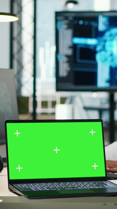 Vertical video Startup office programmer using green screen laptop, developing Stock Footage 312768606