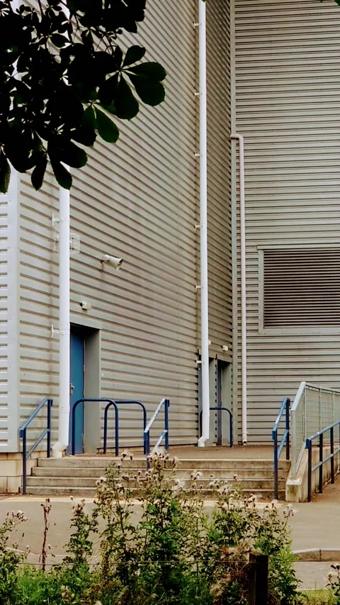 Vertical Video. Static shot of a modern metal building. 動画素材 160076866