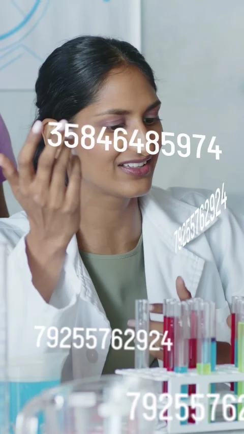 Vertical video: STEM teacher gesturing at tubes in lab making floating data over Stock Footage 334694870
