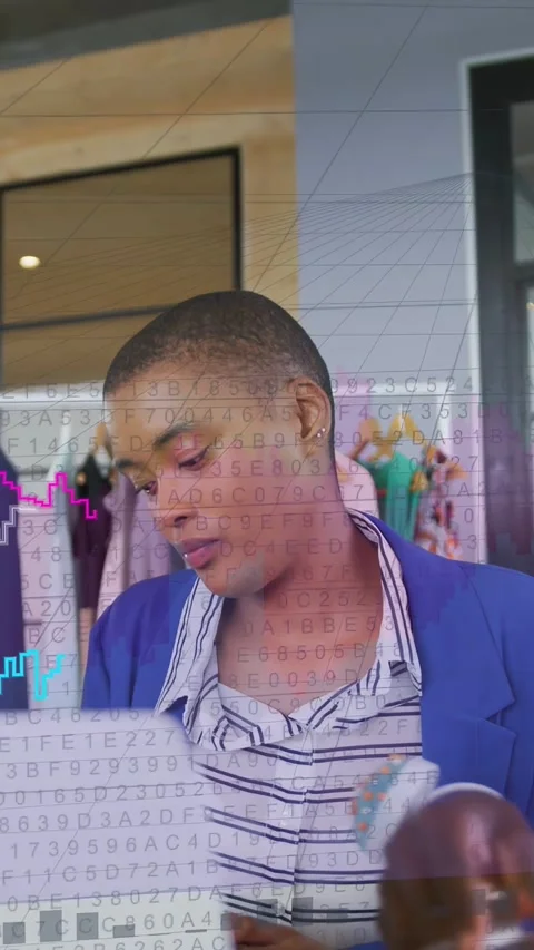 Vertical video: Store rep using pen on tablet activating overlaying code and Stock Footage 333577316