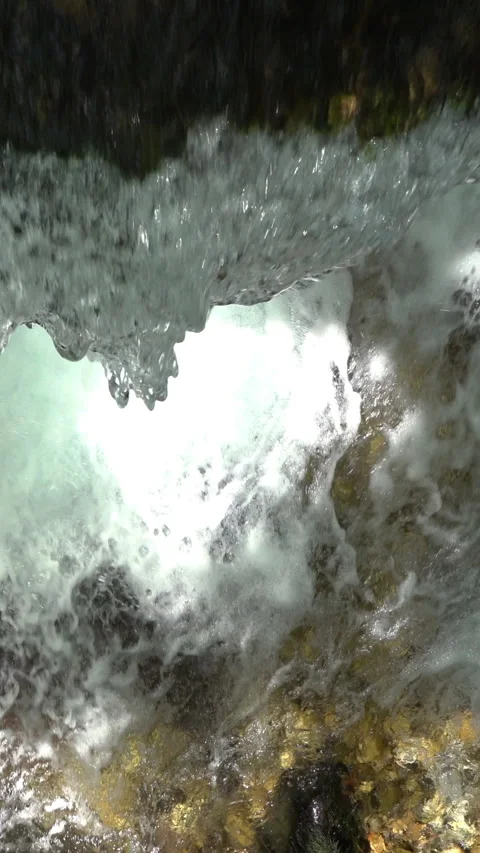 Vertical video, Stream in the mountains Stock Footage 313146476