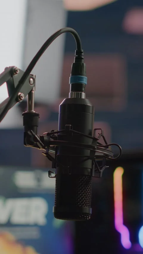 Vertical video: Streaming professsional microphone in empty gaming home studio Stock Footage 219801323