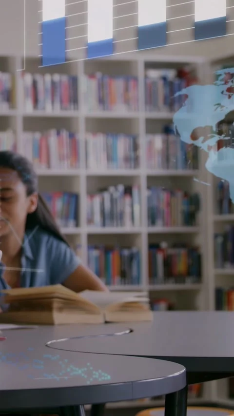 Vertical video: Student turning page in library sparking data overlay with bars Stock Footage 333020774