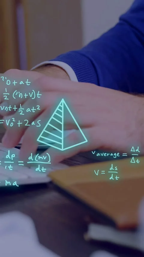 Vertical video: Student typing causing 3D pyramid and equations growing over Stock Footage 334694936