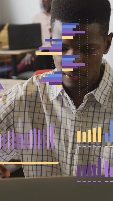 Vertical video: Student typing for study in class, causing data charts over desk Stock Footage 333596487