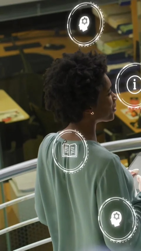 Vertical video: Student walking railing in library, AR icons appearing causing Stock Footage 332985272
