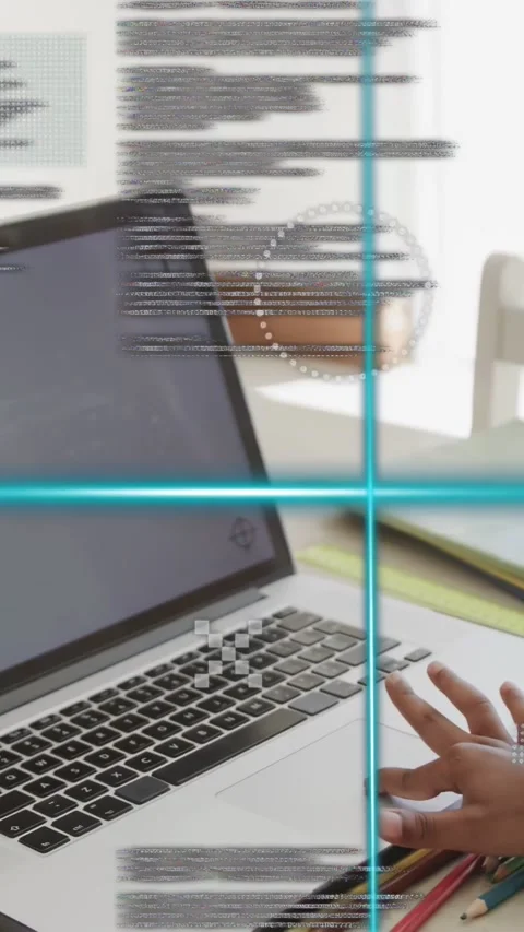 Vertical video: Student's right hand hovering, tapping trackpad, activating tech Stock Footage 334770740