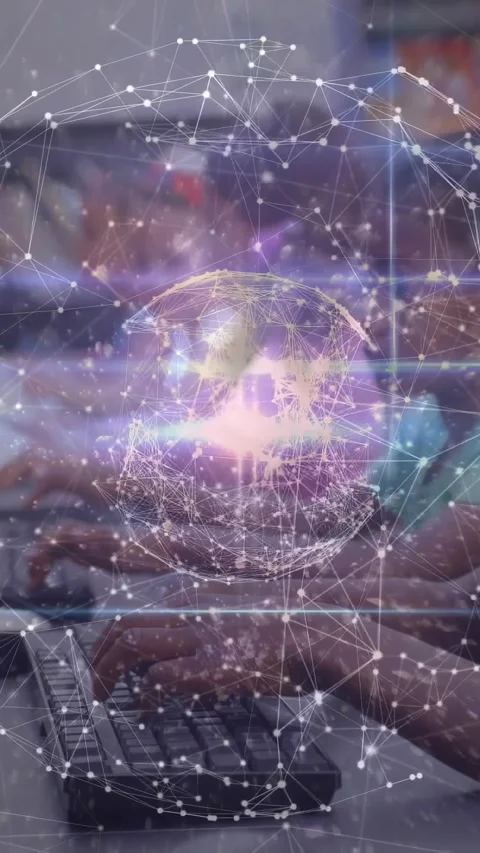 Vertical video: Students typing at keys causing globe and node net pulsing above Video stock 331333914