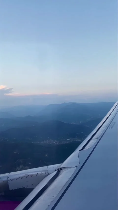 Vertical video Stunning Mountain View Over Bergamo from Airplane During Landing Stock Footage 308808498