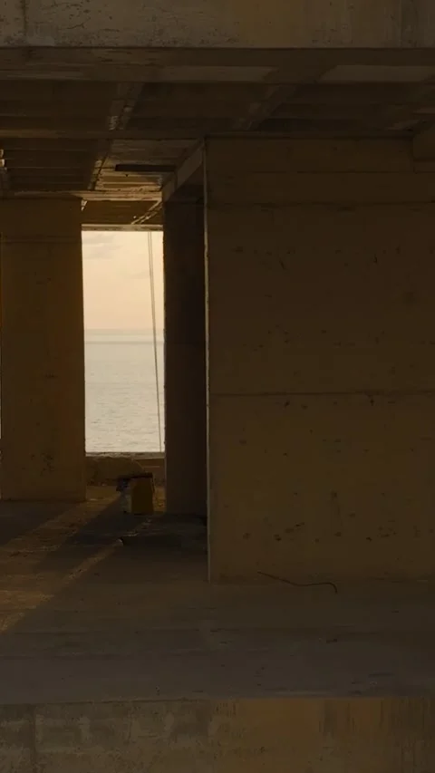 Vertical Video: Stunning oceanfront site with the framework of a luxury Stock Footage 297657972