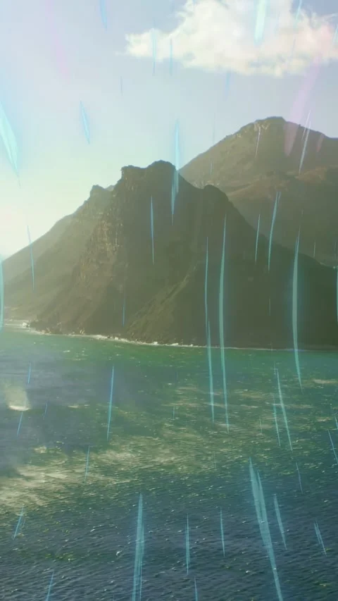 Vertical video: Sun shifting causing cyan streaks crossing rock island, waves Stock Footage 334047093