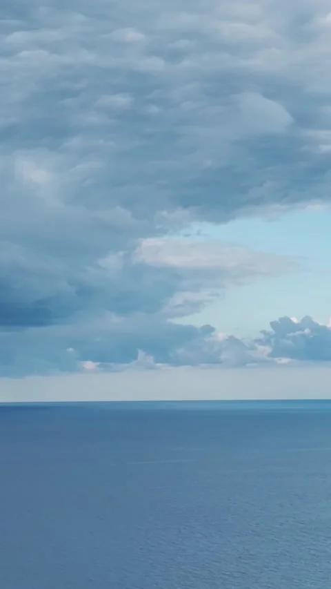 Vertical Video: Sunset magic unfolds over the Mediterranean Sea with vivid hues Video stock 297641976
