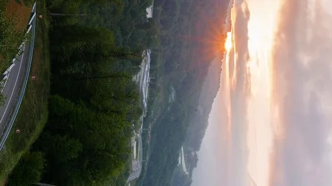 Vertical video. Sunset in the mountains. Rosa Khutor, Sochi, Russia Stock Footage 83679300