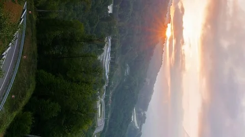Vertical video. Sunset in the mountains. Rosa Khutor, Sochi, Russia Vídeo Stock 83685827