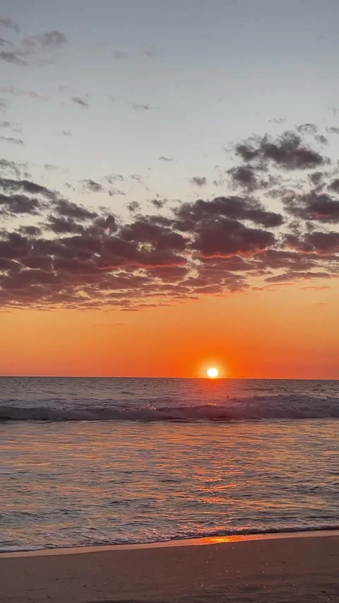 Vertical video sunset on the ocean shore Stock Footage 286043134