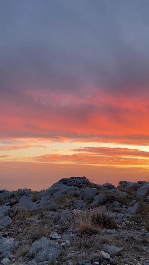 Vertical video of sunset sky over rocky coast in Dubrovnik Croatia Stock Footage 315655913