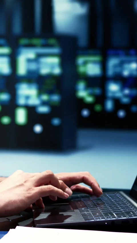 Vertical video Supervisor doing server diagnostic test Stock Footage 245916383