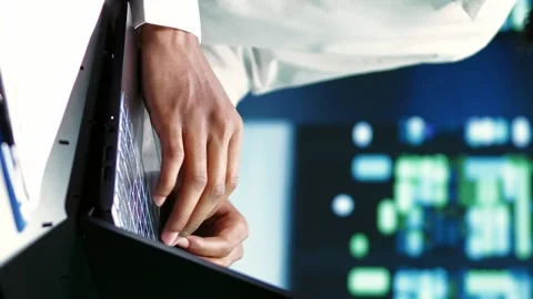 Vertical video Supervisor mending data center issues Stock Footage 246014340