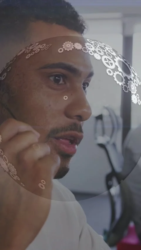 Vertical video: Support rep on call, moving mic and speaking to help, gear Stock Footage 332594629