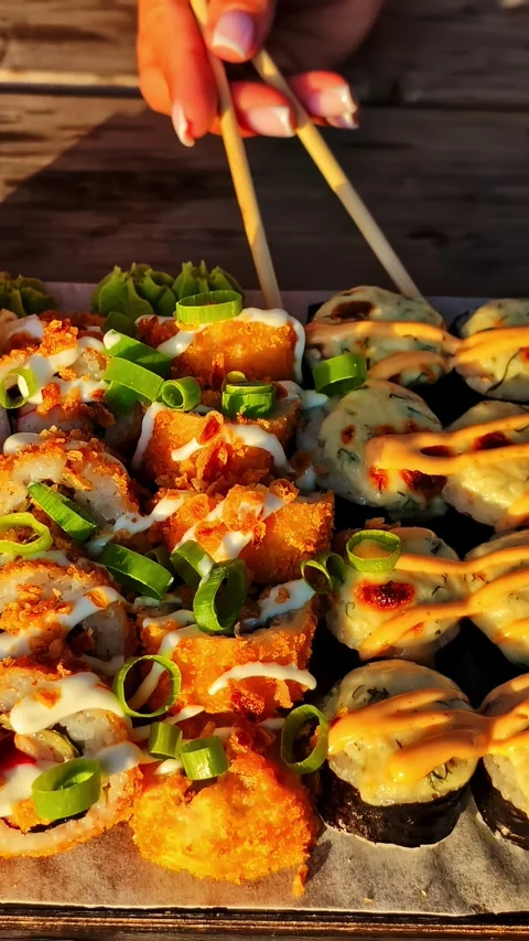 Vertical Video - Sushi Platter Served Outdoors, Close Up Stock Footage 337552032