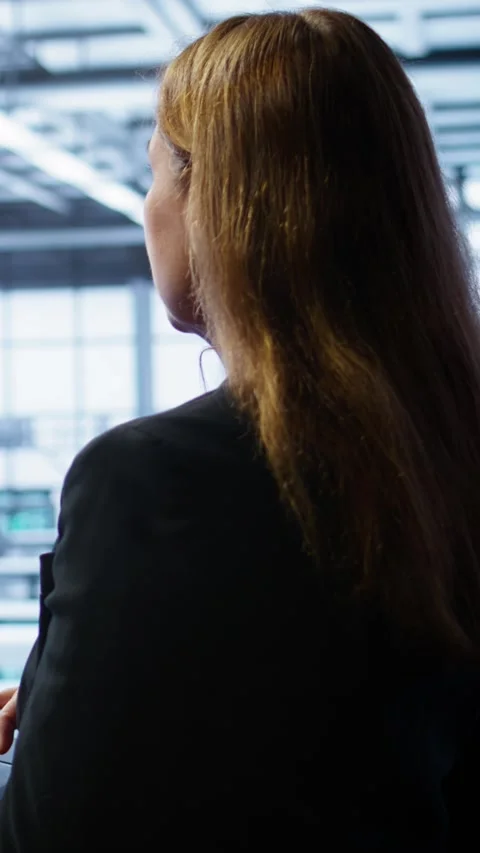 Vertical video System administrator in data center running error checking Stock Footage 277858556